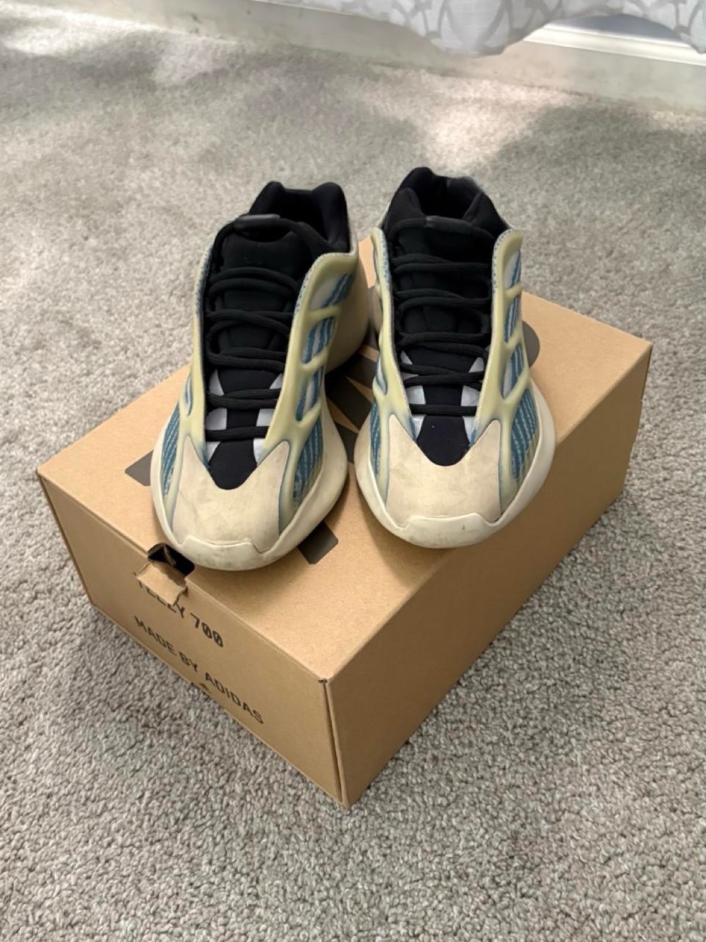 Yeezy 700 V3 Men’s Sneakers in Cream and Black with Blue Accents